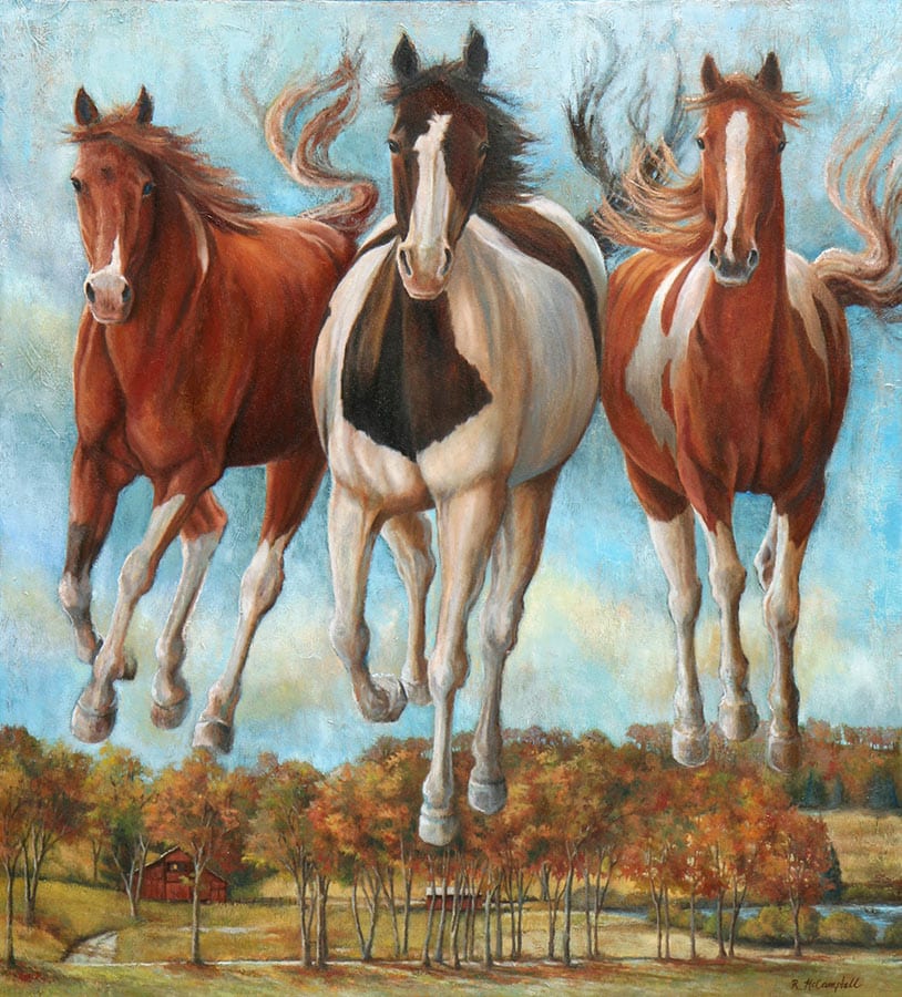 Three horses in an autumn landscape