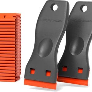 A set of orange and black plastic handles next to each other.